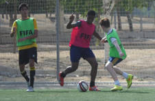 Thumbnail les footballeurs de l’ISC Spain jouant un match en Espagne
